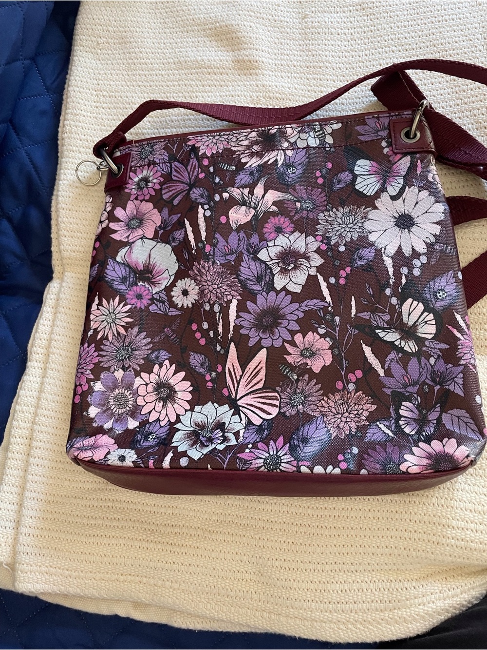Sakroots Floral Crossbody Bag in Burgundy with Pink, Purple and White Accents - Picture 2 of 7